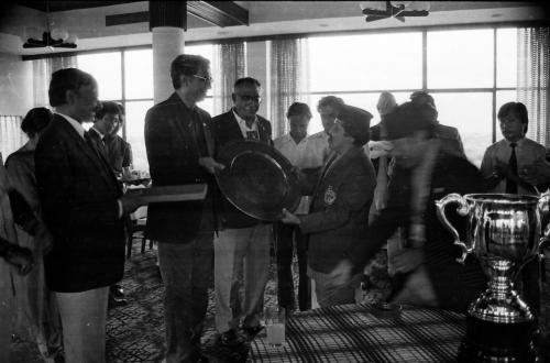 President of the Nepal Olympic Committee Sharad Chandra Shaha (centre) receives memento from the President of the Indian Olympic Association, V. C. Shukla during the 1st South Asia Federation Games, Kathmandu, Nepal, 1984