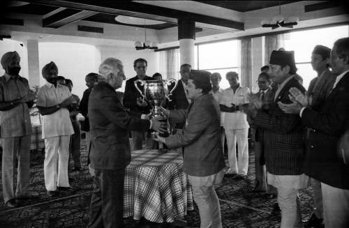 President of Nepal Olympic Committee Sharad Chandra Shaha (centre) receiving SAF Championship Trophy for SAF Games from Secretary General of Indian Olympic Association AVM C. L. Mehta