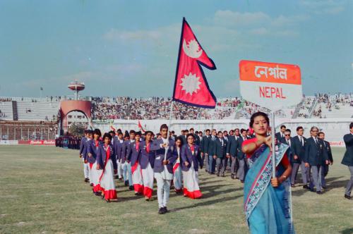 Nepali contingent led by its flag bearer Baikuntha Manandhar at its stadium during the opening ceremony of the 2nd South Asia Federation Games, Dhaka, Bangladesh December 20 - 26, 1985