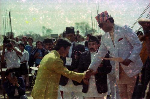 Patron of the National Sports Council HRH Prince Dhirendra awarding certificate to a referee during the 3rd National Games, Birgunj. Present on the occasion is the Member Secretary of the National Sports Council Sharad Chandra Shaha (centre)