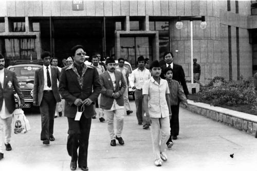 Patron of the National Sports Council HRH Prince Dhirendra (left) entering the 9th Asian Games venue along with HRH Crown Prince Dipendra (right) followed by the President of Nepal Olympic Committee Sharad Chandra Shaha (centre)