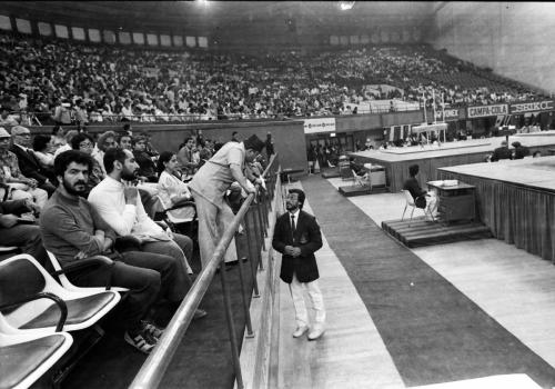 President of Nepal Olympic Committee Sharad Chandra Shaha being briefed by the Secretary/Coach of Nepal Gymnastics Association Mukunda Lal Nakarmi during gymnastic competition at 9th Asian Games