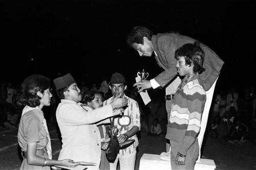 Member Secretary of the National Sports Council Sharad Chandra Shaha awarding prizes during the Athletics Championship, Dashrath Stadium