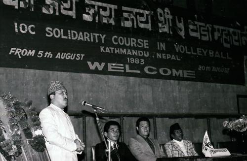 President of Nepal Olympic Committee Sharad Chandra Shaha addresses the opening session of the IOC Solidarity Course in Volleyball, Kathmandu, Nepal (August 5 - 20, 1983). Also seen during the occasion is the Minister for Education and Sports/Youth Fateh Singh Tharu (right)